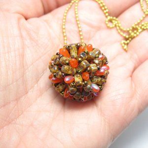 Handwoven Fall color beaded bead pendant